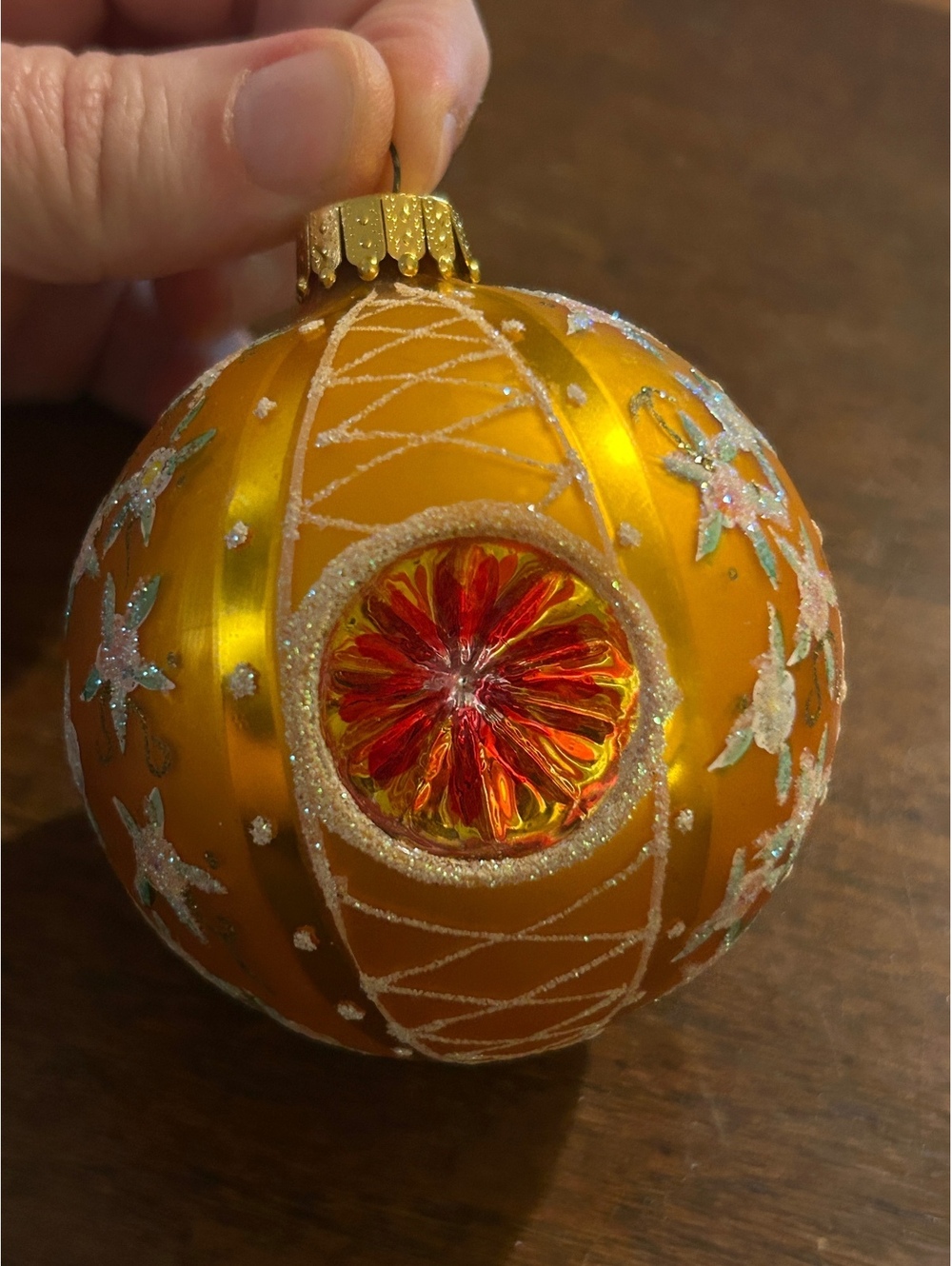 Vintage Orange Glass Christmas Ornament with Floral Glitter Design